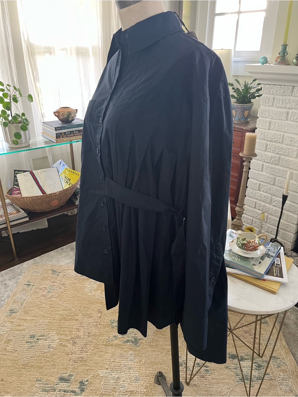 Zara asymmetrical navy blouse w/adjustable waist tie. Fits Medium, marked small.